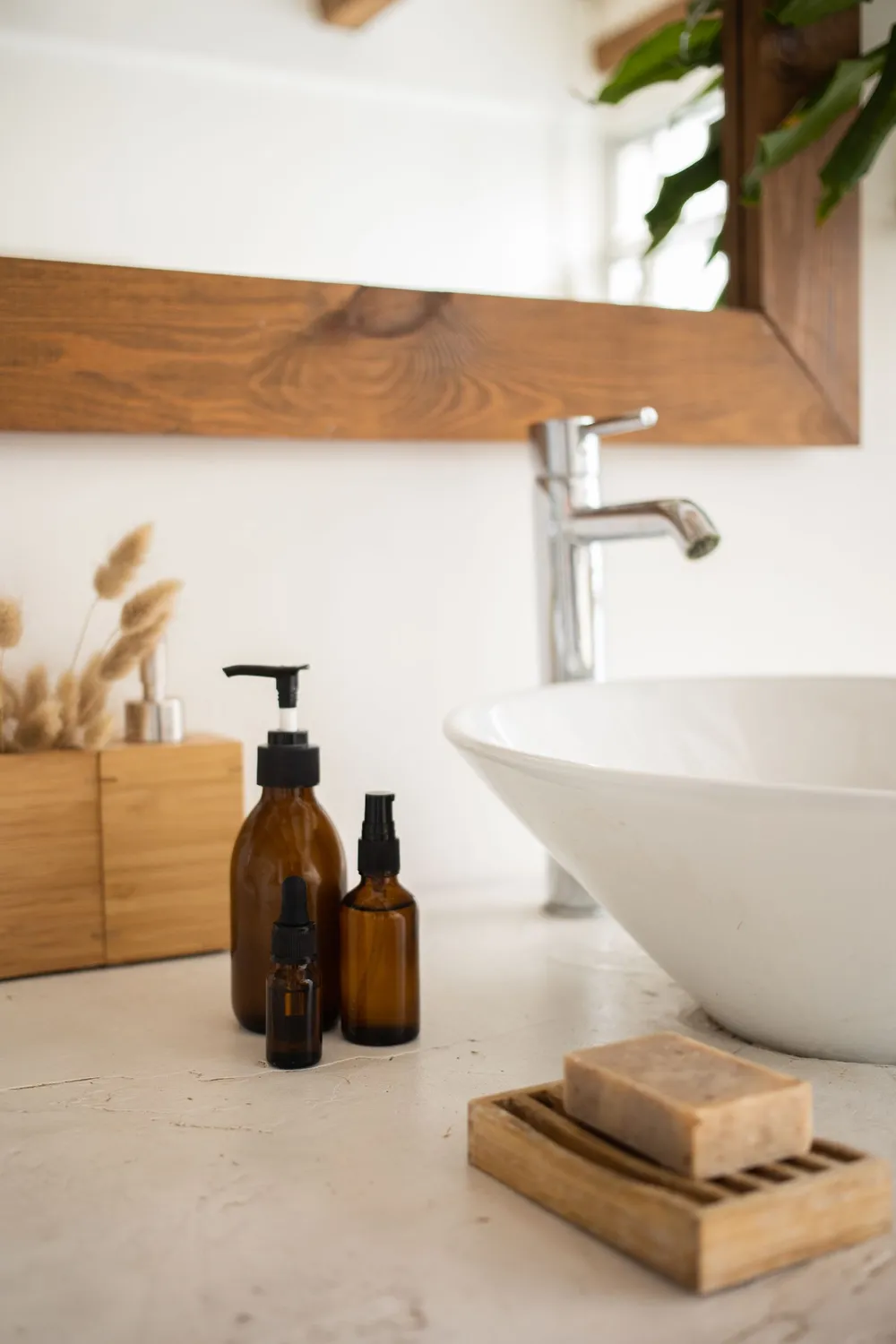 Clean studio counter with amber glass bottles